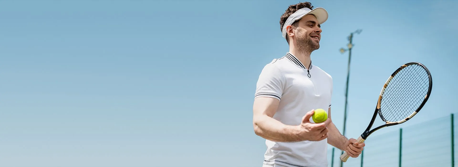 banner-cheerful-tennis-player-in-visor-cap-holdin-2026-01-05-23-54-18-utc