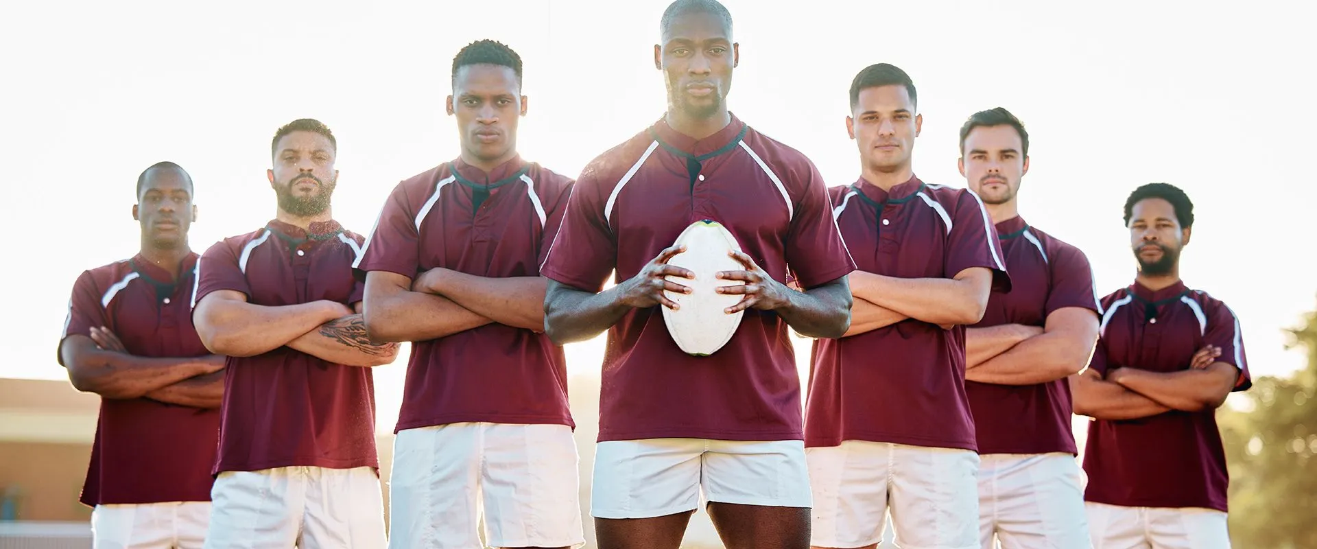 rugby-black-man-with-ball-and-team-portrait-on-fi-2026-03-25-02-17-44-utc